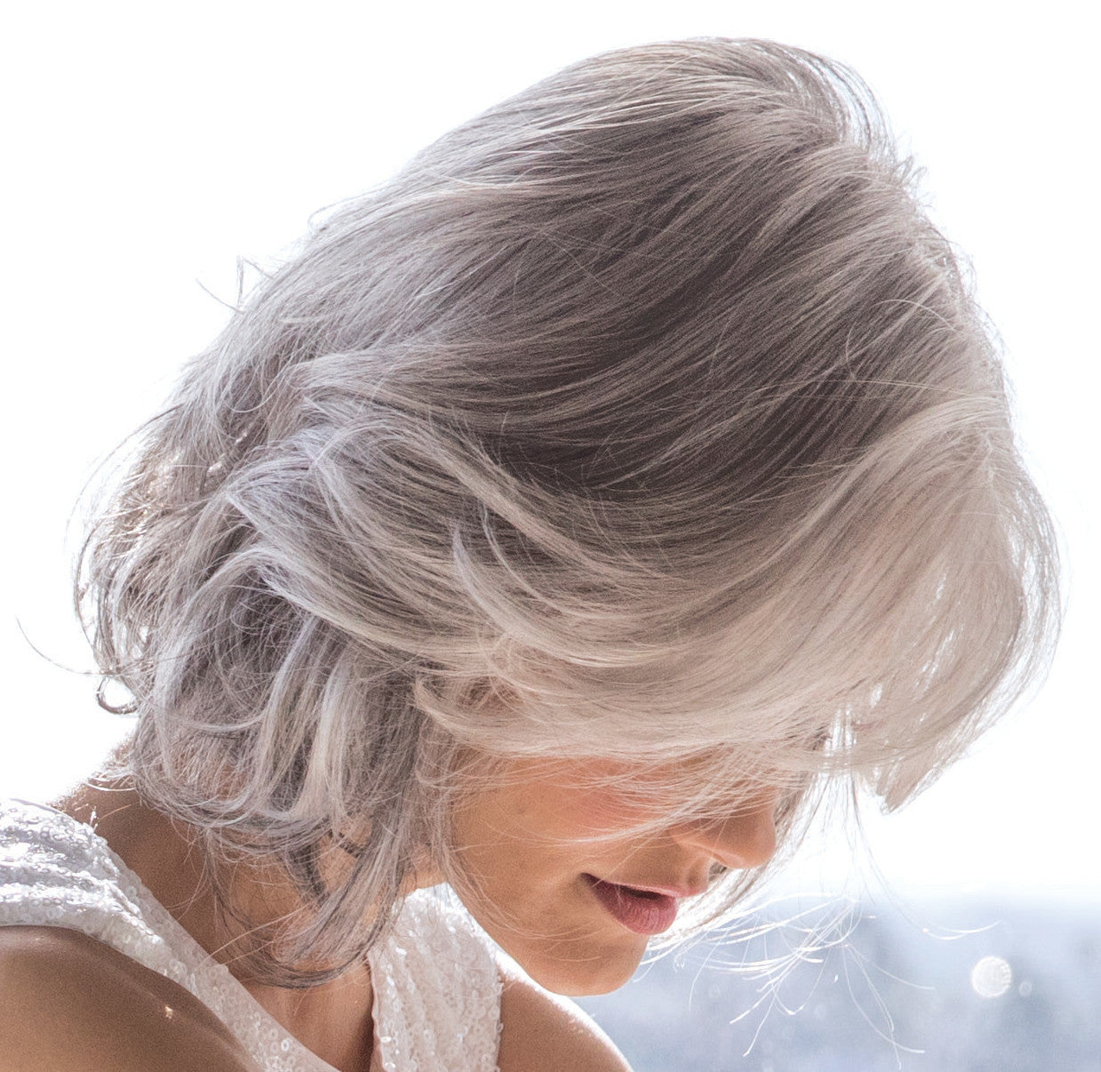 Rene of Paris Amal Synthetic Wig Side View