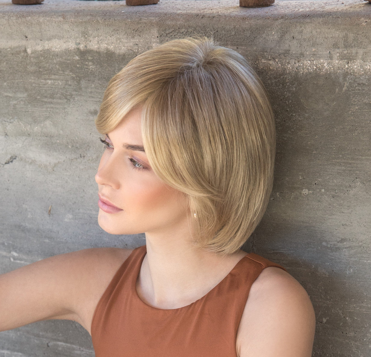 Tate | Amore Wigs | Lace Front Monotop | side view 1 Color: spring honey